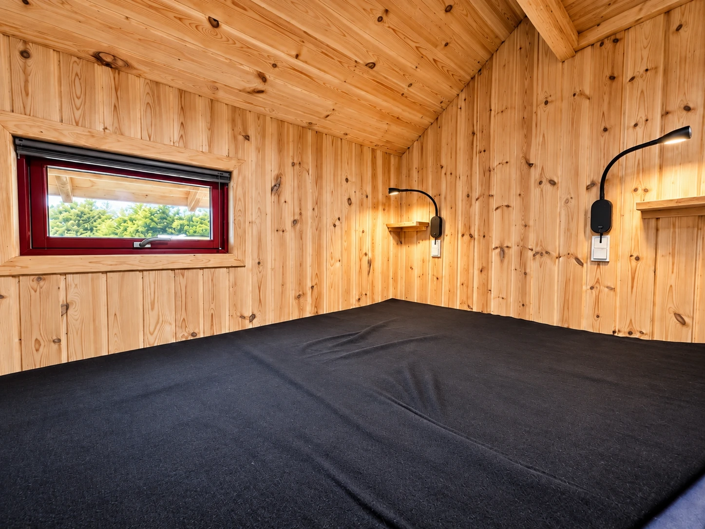 Komforthytte – bedroom Double bed in the bedroom of the Komforthytte